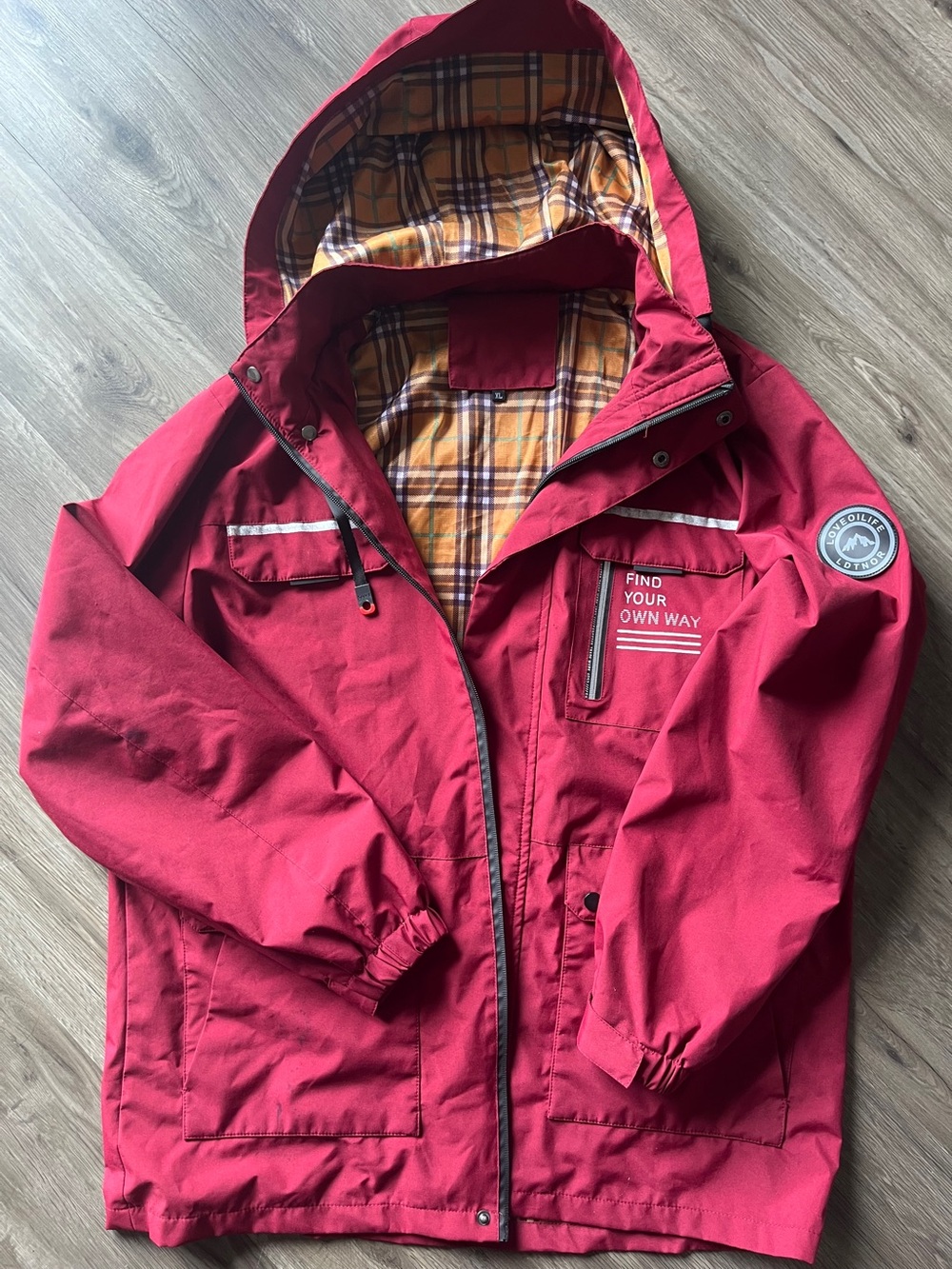 Letuntino light weight jacket wins water proof. Uplifting message in chest redXL